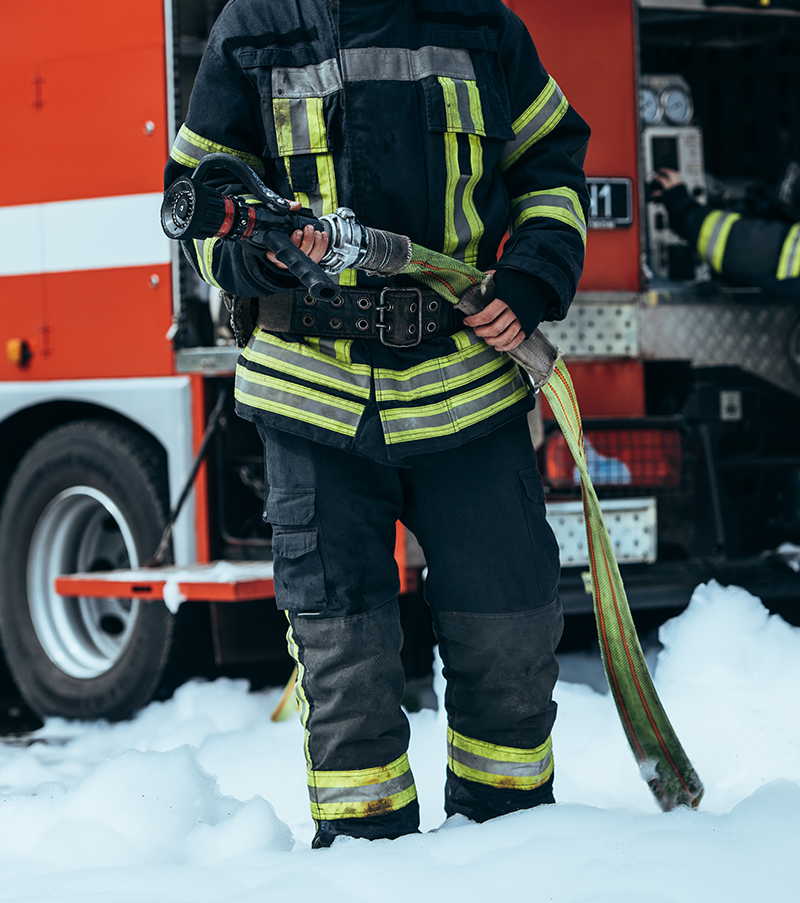 firefighter turning off the hose.